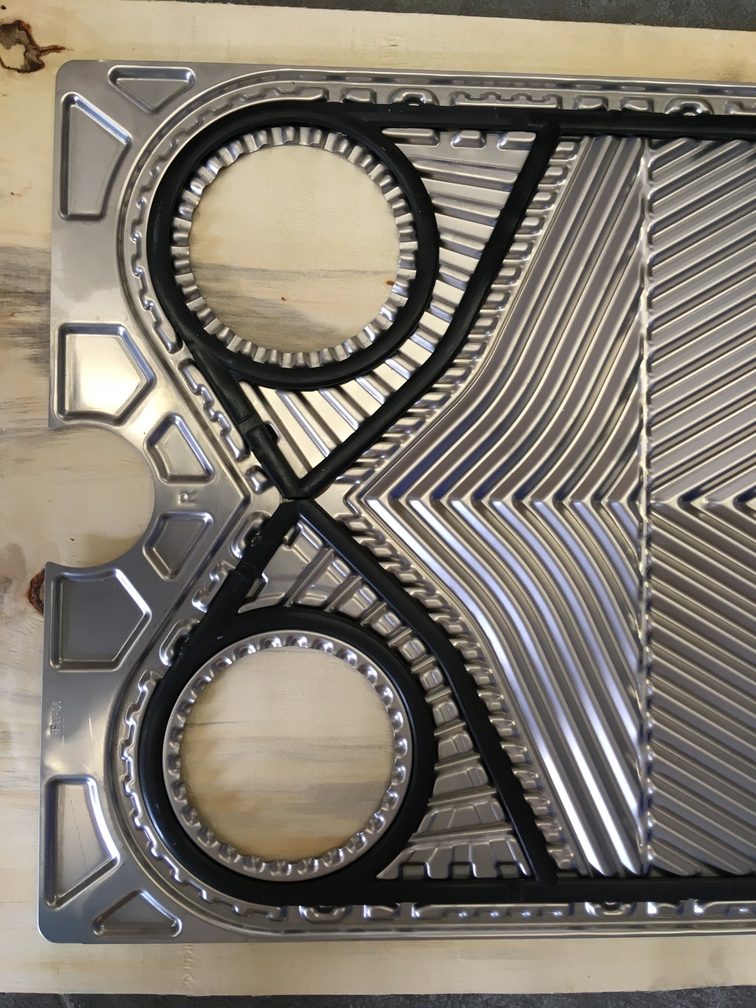 Austausch eines Plattenpakets mit Kasetten durch ein gedichtetes Plattenpaket